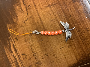 Orange dragonfly charm