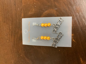 Orange peace earrings