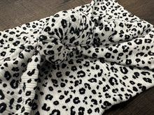 Load image into Gallery viewer, Black and white cheetah top knot