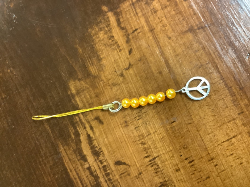 Orange peace charm