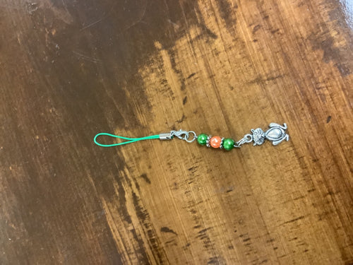 Green/orange cat charm