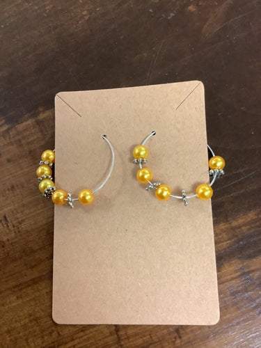 Orange hoop earrings