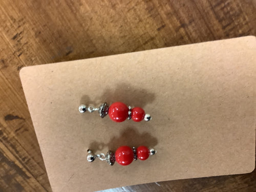 2 red earrings